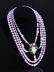 A MULTI STRAND BEADED NECKLACE,
