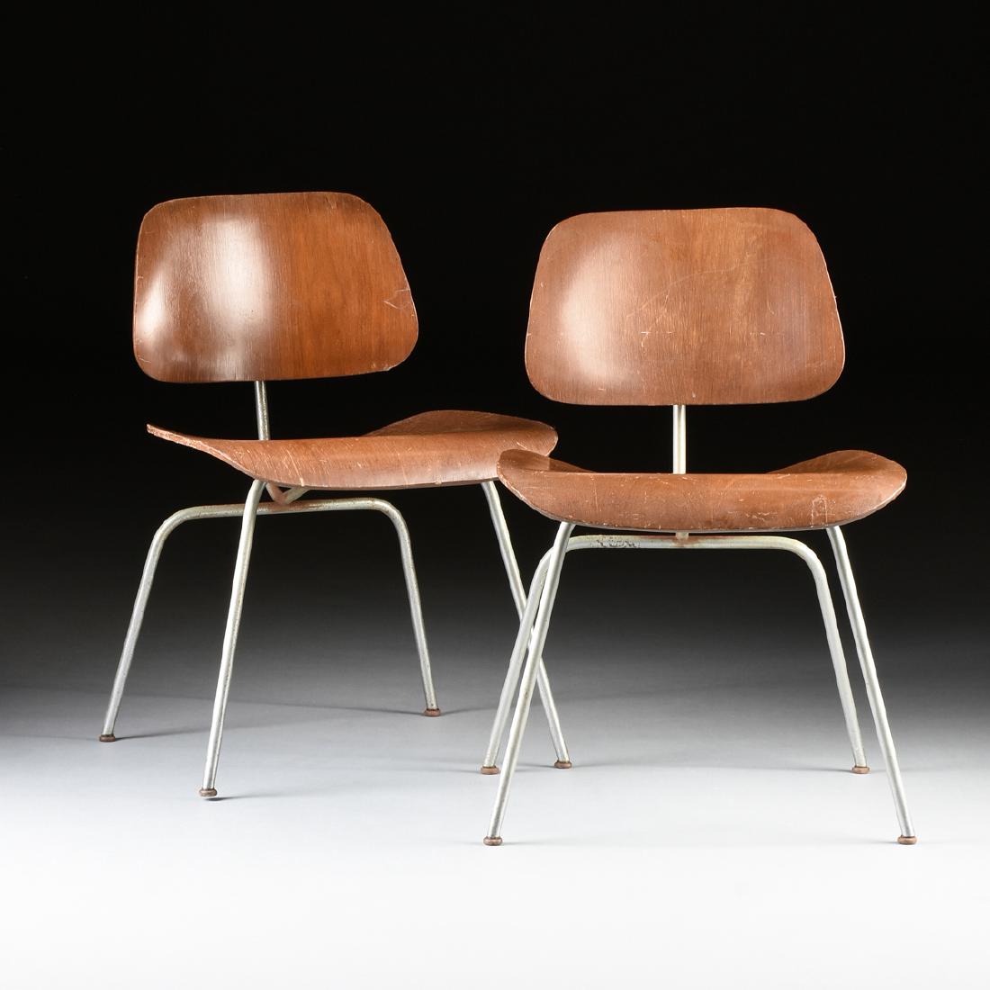A PAIR OF CHARLES AND RAY EAMES "DCM" MOLDED WALNUT (1 of 6)