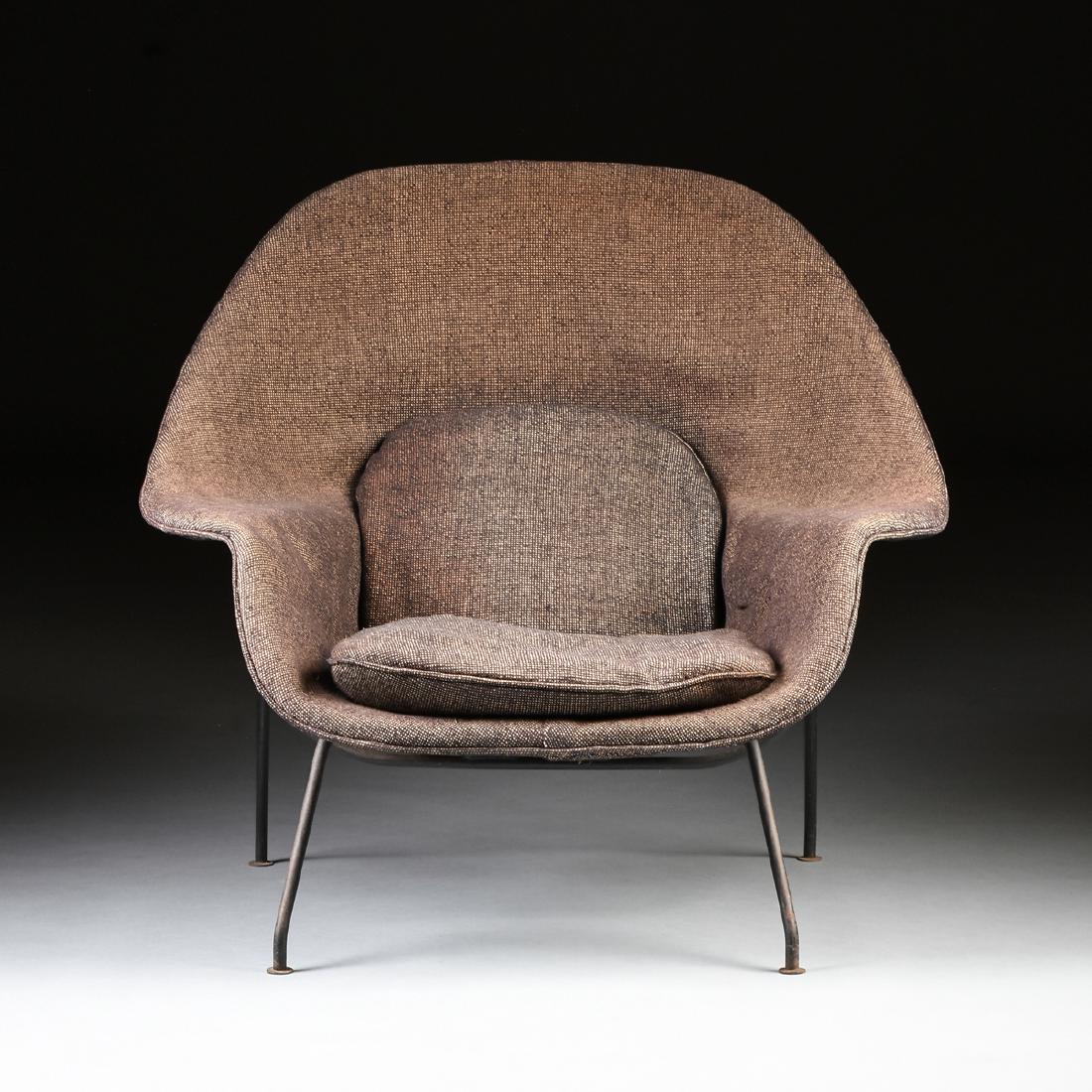 EERO SAARINEN (Finnish/American 1910-1961) A "WOMB": EERO SAARINEN (Finnish/American 1910-1961) A "WOMB" CHAIR, DESIGNED 1948, FOR KNOLL ASSOCIATES, PRODUCED CIRCA 1950-1960, the upholstered foam covered molded fiberglass chair with black painted steel 