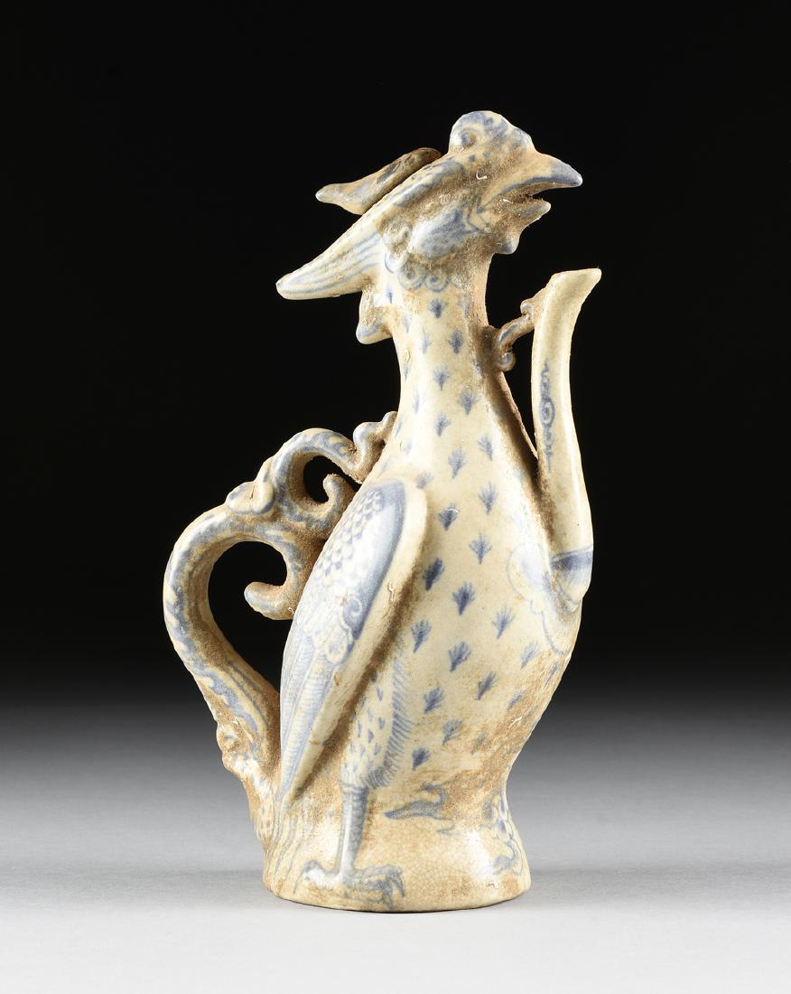A VIETNAMESE/ANNAMESE BLUE AND WHITE CERAMIC PHOENIX (1 of 11)