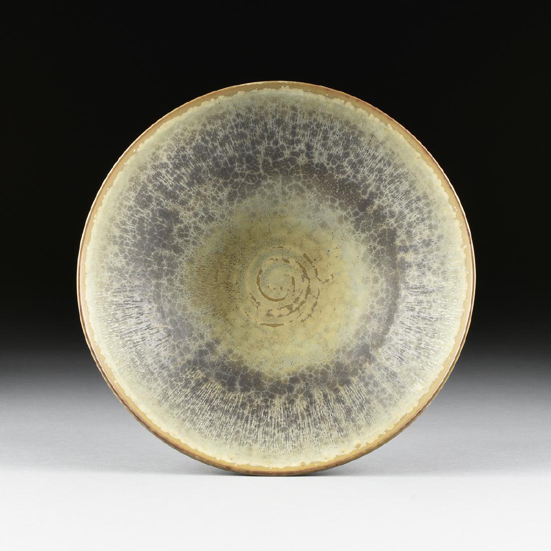 CARL-HARRY STALHANE (Swedish 1920-1990) A LARGE: CARL-HARRY STALHANE (Swedish 1920-1990) A LARGE CRYSTALLINE GLAZED STONEWARE BOWL FOR RORSTRAND, LIDKOPING, SWEDEN, CIRCA 1950-1953, with mottled and striated yellow/green crystalline glaze. Marked "R