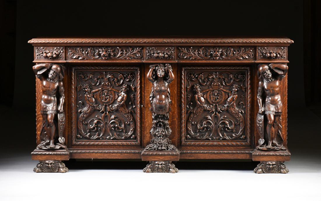 AN AMERICAN BAROQUE STYLE FIGURAL CARVED OAK SIDEBOARD, (1 of 9)