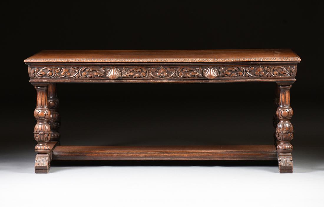 AN AMERICAN BAROQUE REVIVAL STYLE CARVED OAK LIBRARY (1 of 8)