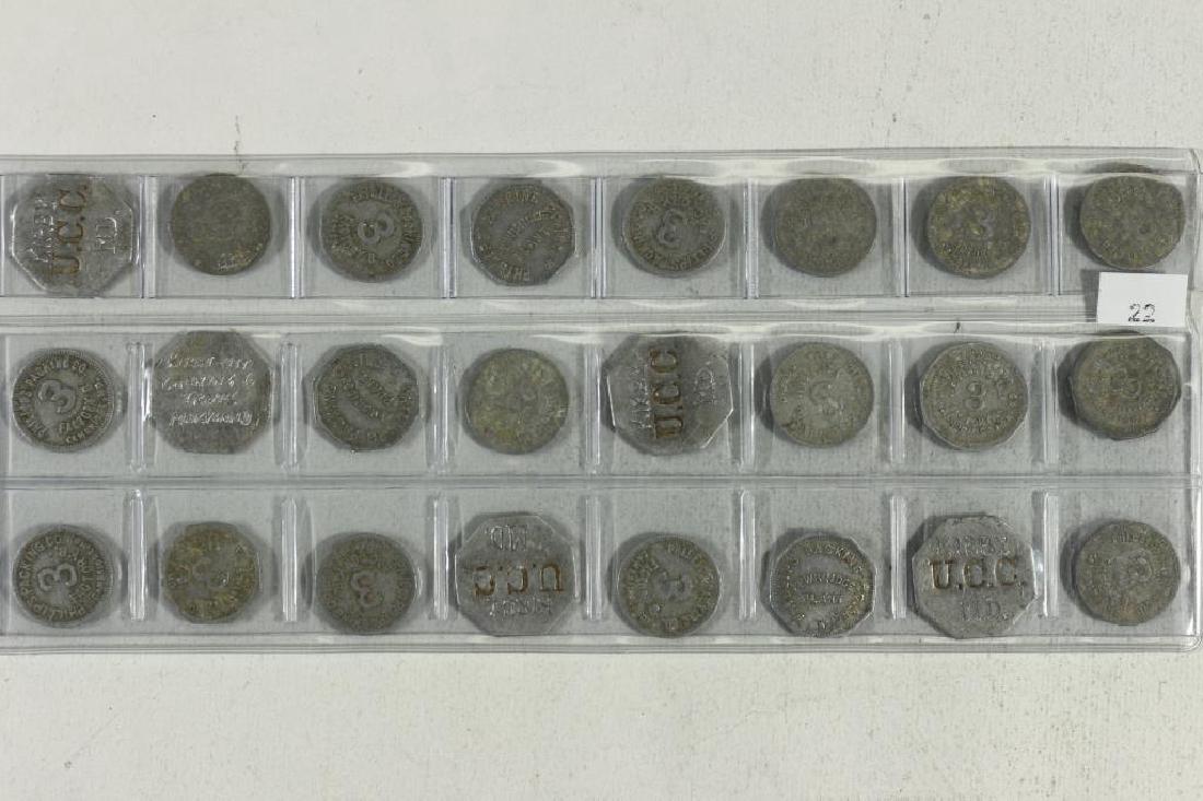 24 ASSORTED VINTAGE US TOKENS (1 of 2)