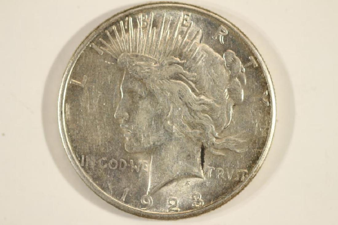 1923-S PEACE SILVER DOLLAR: You must call us at 1-763-862-8302 or email us at bidalotauction@aol.com with your credit card number directly. Thanks.