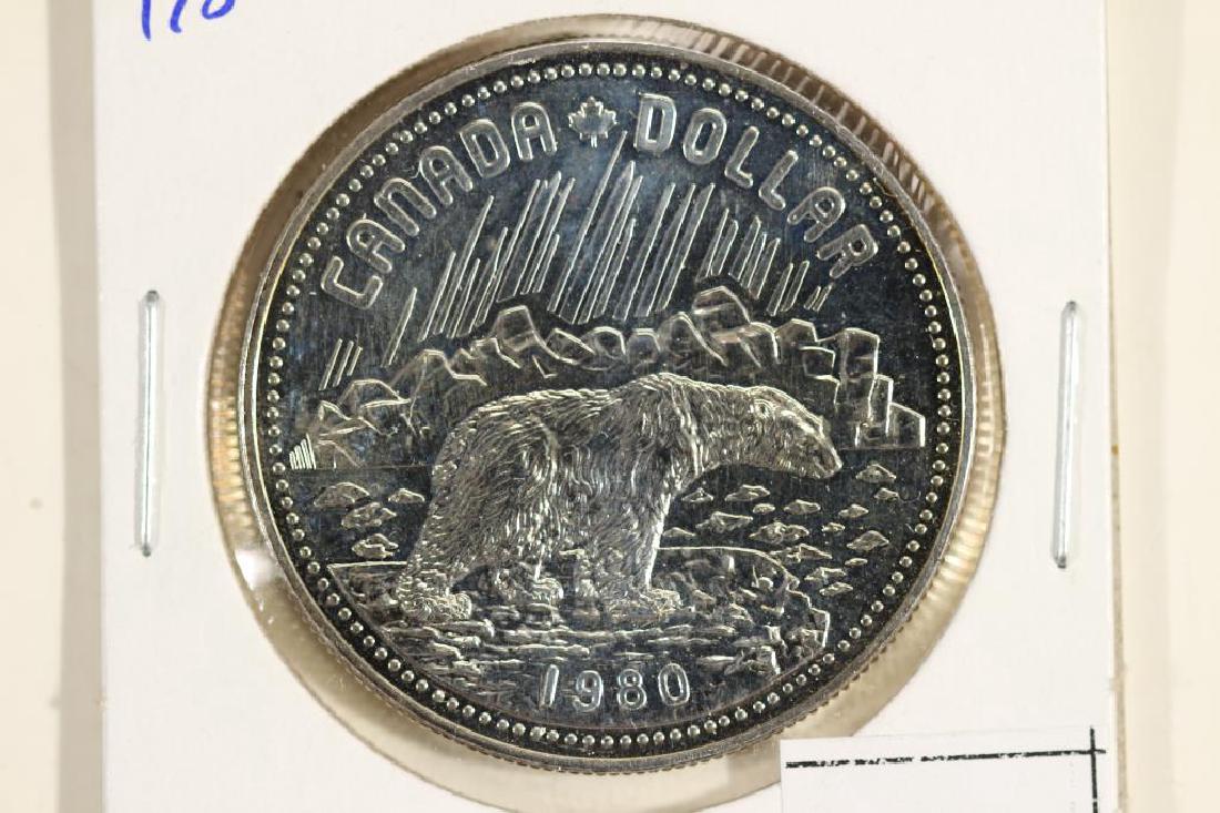 1980 CANADA POLAR BEAR SILVER DOLLAR (PF LIKE): You must call us at 1-763-862-8302 or email us at bidalotauction@aol.com with your credit card number directly. Thanks.