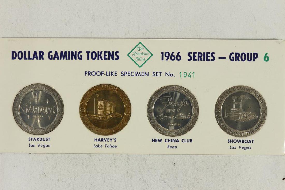 4-$1 GAMING TOKENS 1966 SERIES GROUP 6 (PF LIKE): SPECIMEN SET BY THE FRANKLIN MINT, STARDUST (LAS VEGAS, NEVADA), HARVEY'S (LAKE TAHOE), NEW CHINA CLUB (RENO) AND SHOWBOAT (LAS VEGAS, NEVADA), ORIGINAL PACKAGING