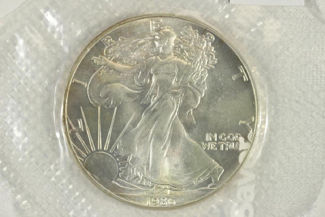 1986 AMERICAN SILVER EAGLE UNC (1 of 2)