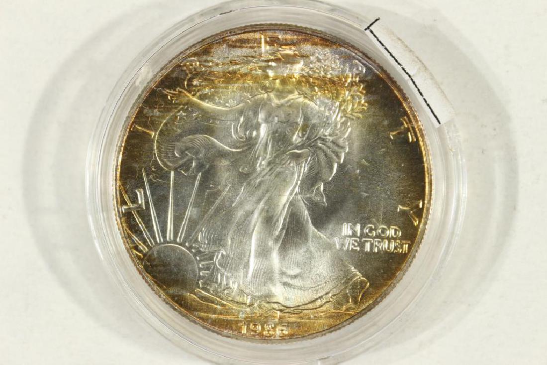 1986 AMERICAN SILVER EAGLE TONED OBV. UNC (1 of 2)