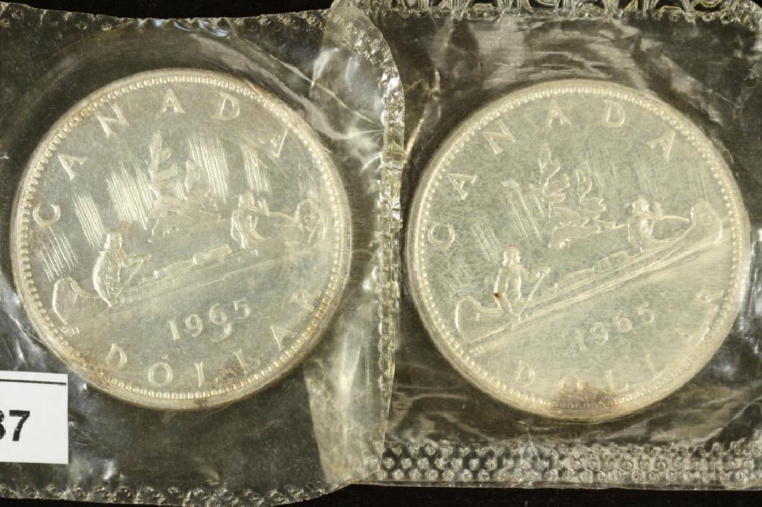 2-1965 CANADA SILVER DOLLARS BU WITH TONING SPOTS (1 of 2)