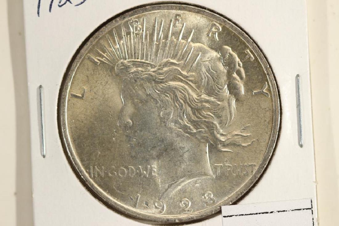 1923 PEACE SILVER DOLLAR BU (1 of 2)