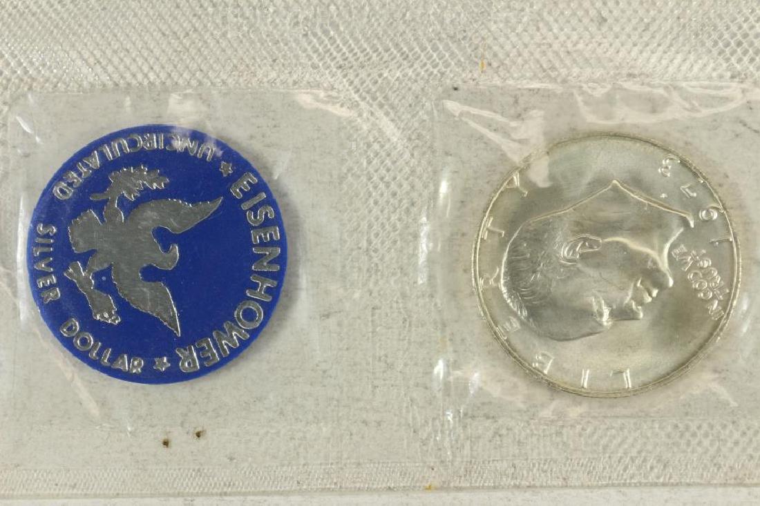 1973-S  IKE SILVER DOLLAR UNCIRCULATED (BLUE PACK) (1 of 2)