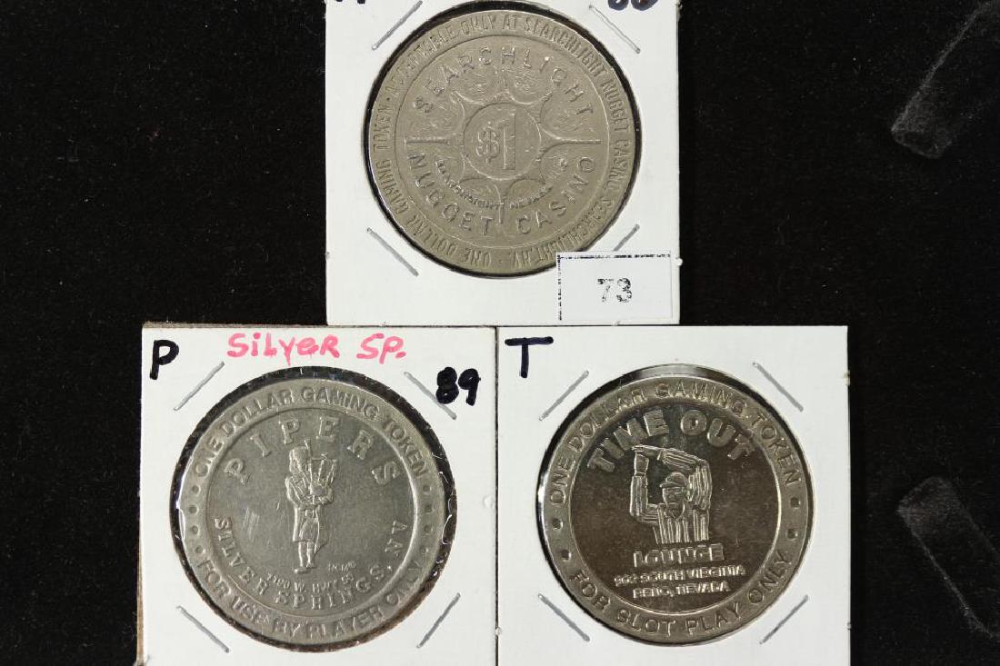 3 ASSORTED $1 GAMING TOKENS 1986 SEARCH LIGHT (1 of 2)