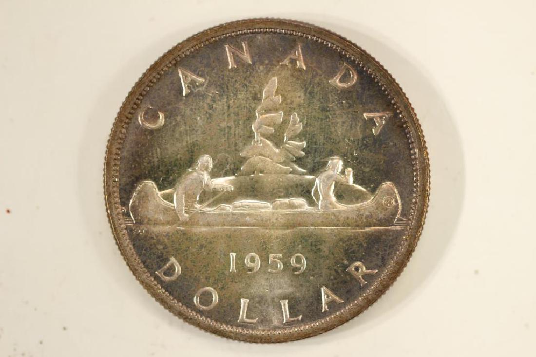 1959 CANADA SILVER DOLLAR TONED BRILLIANT UNC (1 of 2)