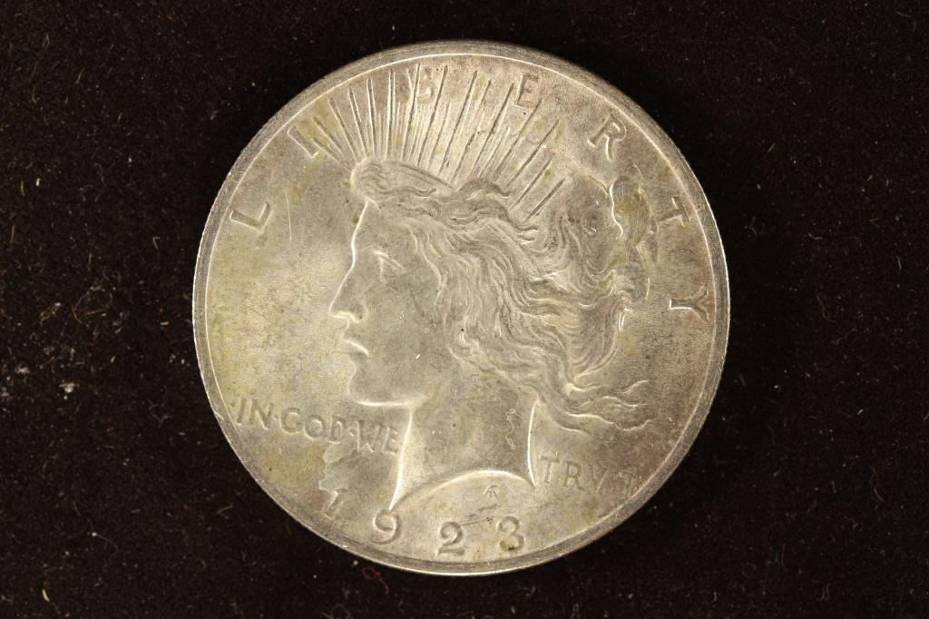 1923 PEACE SILVER DOLLAR UNC (1 of 2)