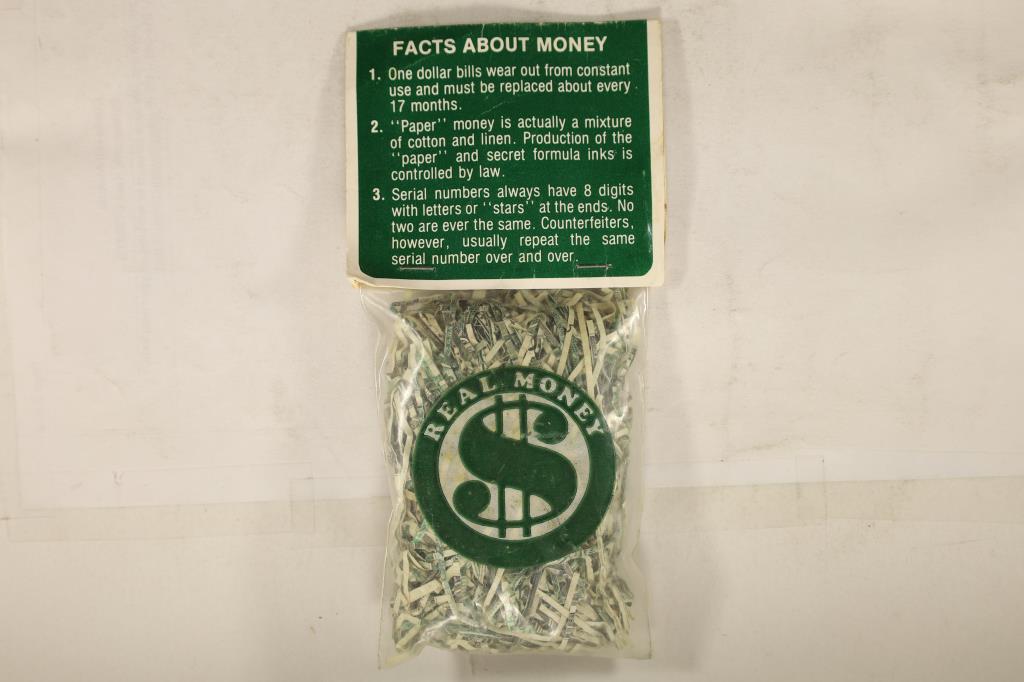 BAG OF SHREDDED US CASH A MIXTURE OF OLD $1, $5,: $10, $20, $50 & $100 BILLS