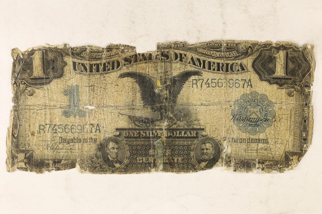 1899 LARGE SIZE $1 BLACK EAGLE RAGGY & TAPED (1 of 2)