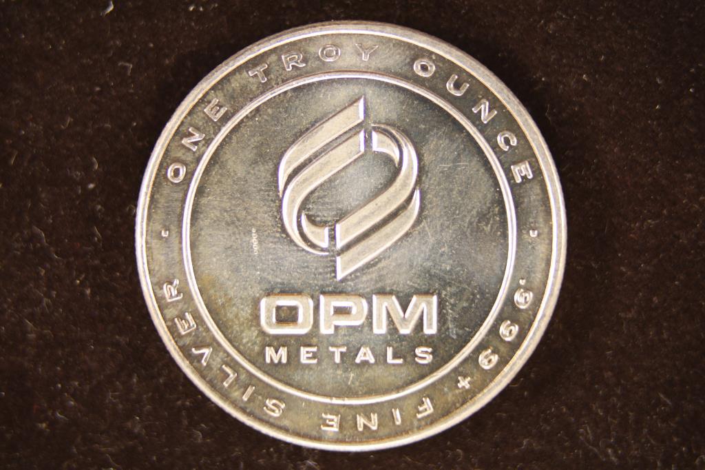 1 TROY OZ .999 FINE SILVER ROUND OPM METALS (1 of 2)