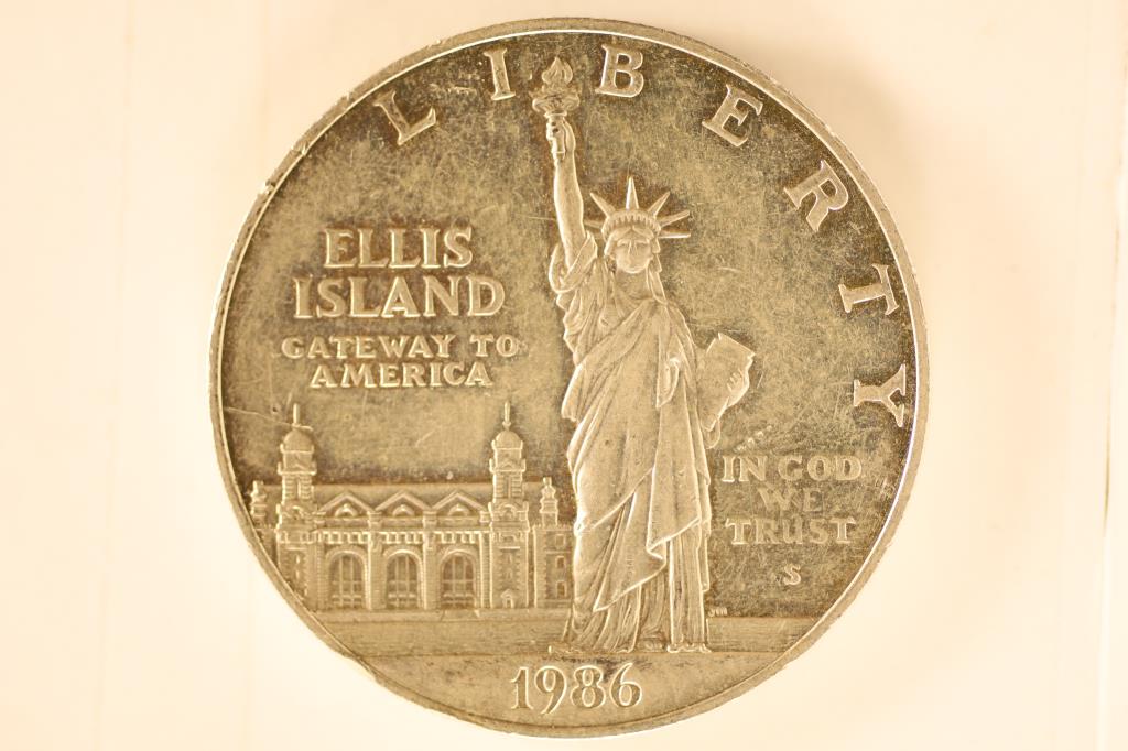 1986 STATUE OF LIBERTY SILVER DOLLAR PROOF IN: TOUGHER SHAPE