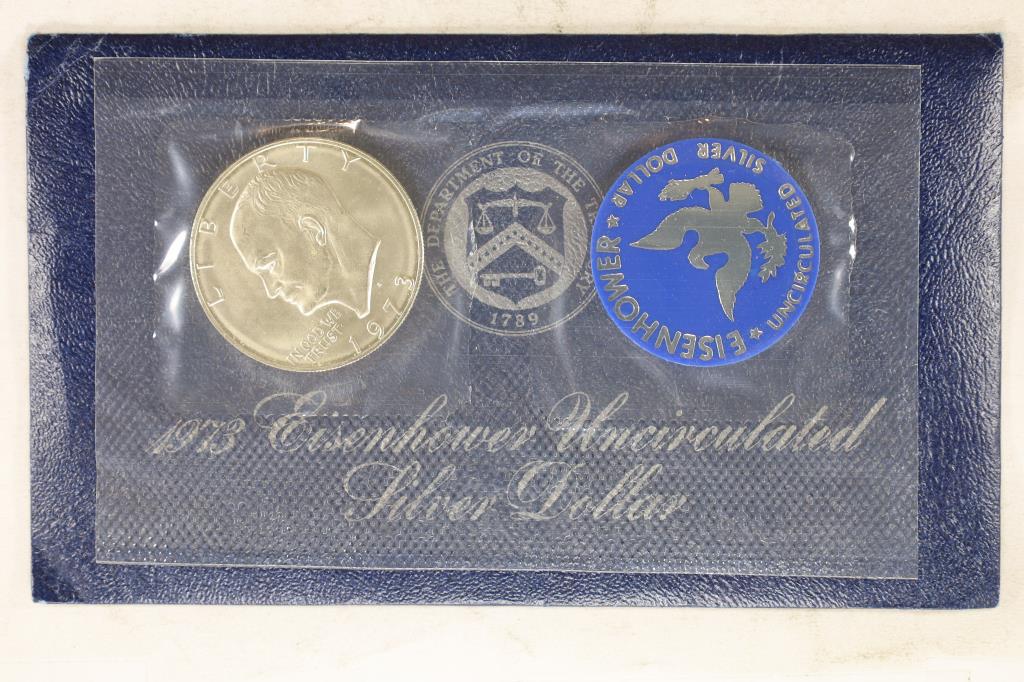 1973 IKE SILVER DOLLAR (BLUE PACK) UNC (1 of 2)
