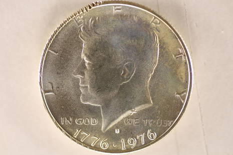 1976-S BICENTENNIAL SILVER KENNEDY HALF DOLLAR: BRILLIANT UNC WITH SOME DAMAGE ON THE RIMS (MINT ERROR???)