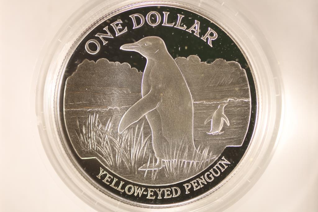 1988 NEW ZEALAND PROOF SILVER DOLLAR YELLOW: EYED PENGUIN IN HARD PLASTIC CAPSULE