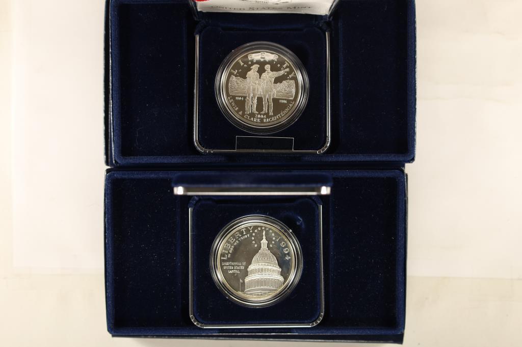 2-COMMEMORATIVE PF SILVER DOLLAR SETS: 1994-S: US CAPITOL BICENTENNIAL PF SILVER DOLLAR AND 2004-P LEWIS & CLARK BICENTENNIAL PROOF SILVER DOLLAR. BOTH IN ORIGINAL US MINT PACKAGING WITH CERTIFICATES
