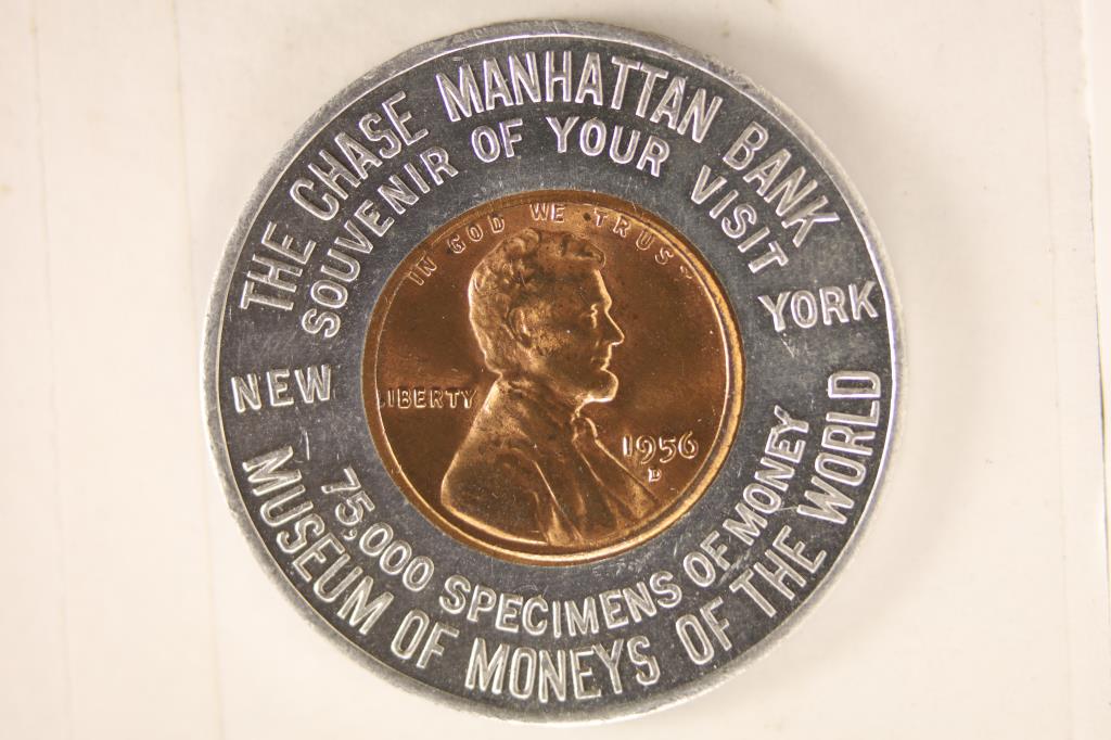 ENCASED 1956-D LINCOLN WHEAT CENT. "CHASE: MANHATTAN BANK, MUSEUM OF MONEYS OF THE WORLD" ON OBVERSE AND "KEEP ME AND NEVER GO BROKE" ON REVERSE