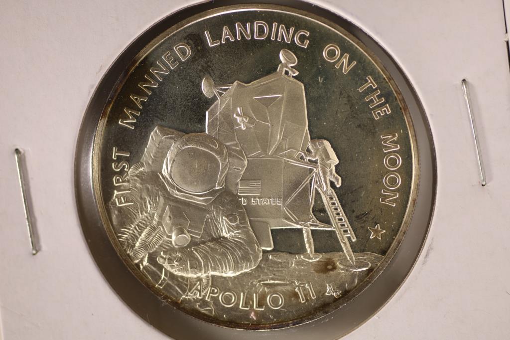 AMERICA IN SPACE .8 OZ PROOF STERLING SILVER: ROUND FROM THE FRANKLIN MINT, JULY 16, 1969, FIRST MANNED LANDING ON THE MOON, APOLLO II.