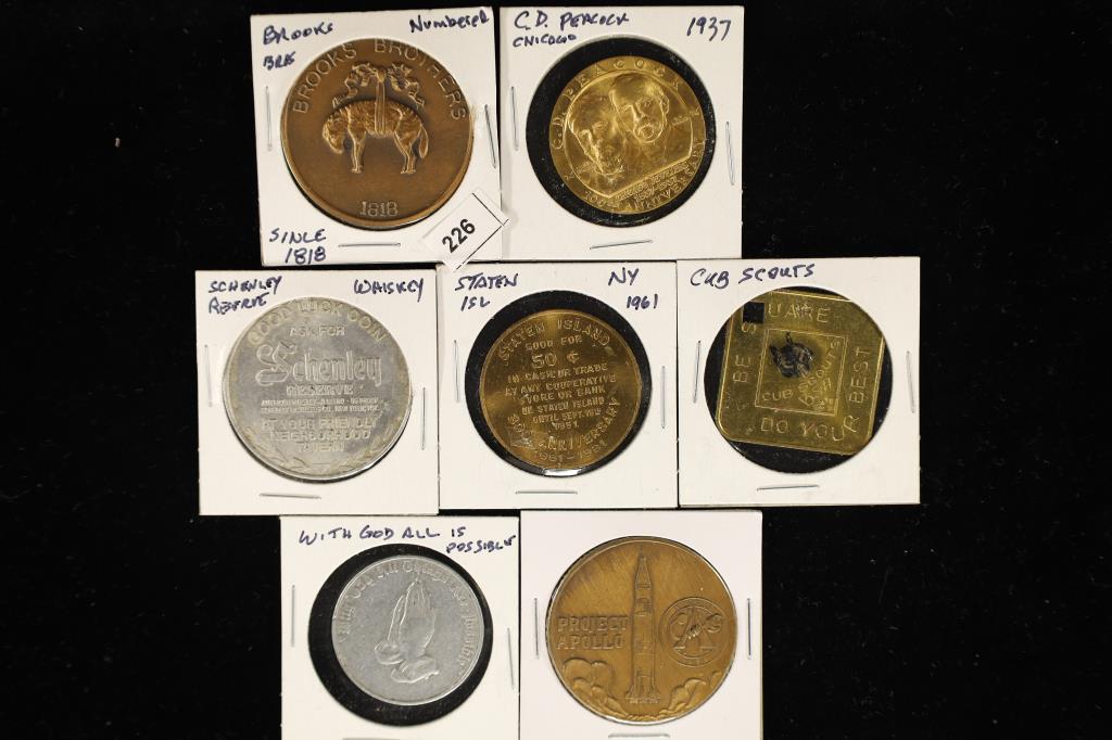 7 ASSORATED METAL TOKENS: 1818 BROOKS BROTHERS, (1 of 2)