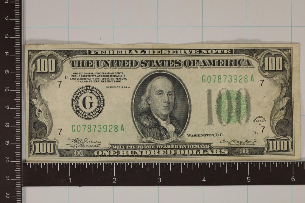 1934-A US $100 FRN GREEN SEAL WITH STAPLE HOLES ON: RIGHT SIDE, CRISP, SMALL INK SPOT REVERSE BOTTOM EDGE