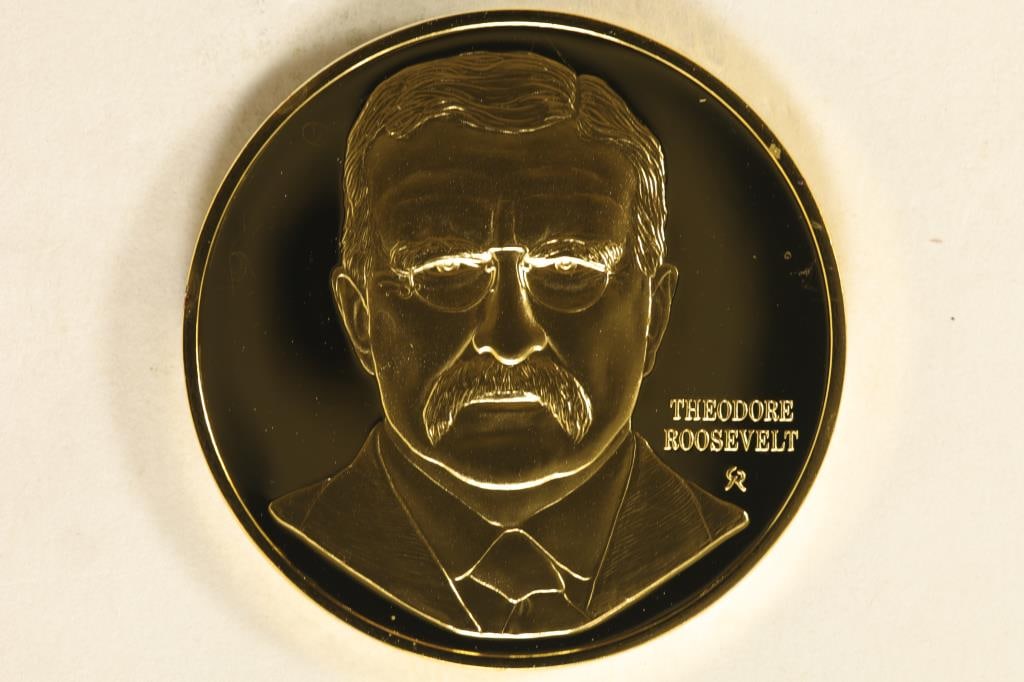 1.3 OZ. GOLD ELECTROPLATED OVER STERLING SILVER: PRESIDENTIAL ROUND PROOF, "THEODORE ROOSEVELT" IN HARD PLASTIC CAPSULE, EDGE MARKED WITH HALL MARKS TOO