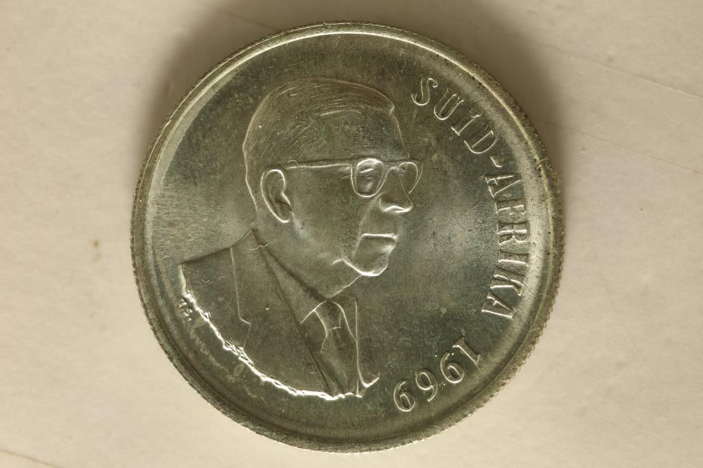 1969 SOUTH AFRICA SILVER 1 RAND. UNC .3858 OZ. ASW: WATCH FOR OUR NEXT AUCTION ON (MONDAY JAN. 8TH, 2024) AT 7PM EASTERN TIME. THANKS FOR YOUR BUSINESS.