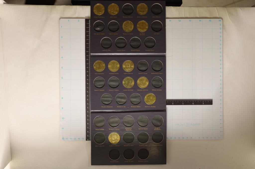 COIN HISTORY OF THE U.S. PRESIDENTS FOLIO WITH 12: PRESIDENTIAL UNC TOKENS.