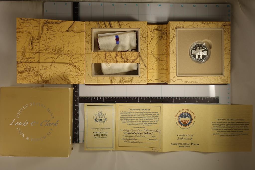 LEWIS & CLARK COIN & POUCH SET INCLUDES: 2004-P: PROOF SILVER LEWIS & CLARK DOLLAR AND HANDMADE INDIAN BEADED HIDE POUCH, IN ORIGINAL US MINT PACKAGING WITH CERTIFICATES. CERTIFICATE FOR THE POUCH IS HAND SIGNED BY THE MAKER FROM THE CROW NATION IN