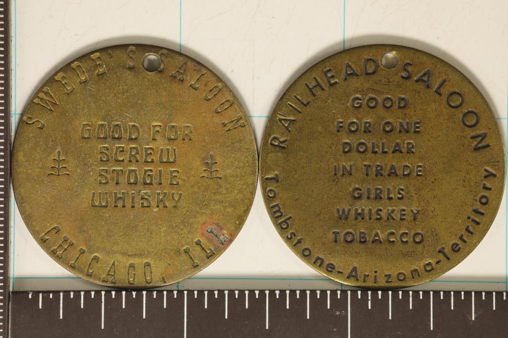 2 VINTAGE METAL 1 1/2" BROTHEL TOKENS: RAILHEAD: SALOON AND SWEDE'S SALOON (WITH HOLE IN EACH)