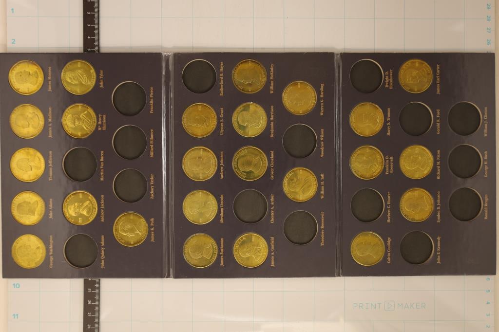 COIN HISTORY OF THE US PRESIDENTS FOLIO CONTAINS:: 25 METAL 1" PRESIDENTIAL TOKENS. NOT A COMPLETE COLLECTION. ALL IN UNC CONDITION