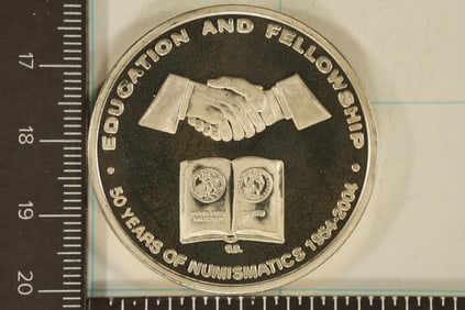 1 TROY OZ .999 FINE SILVER PF ROUND. NUMISMATIC