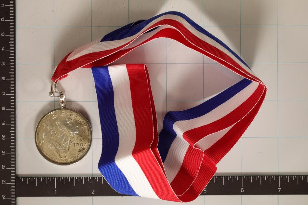 1994-D US SILVER $1 OLYMPIC SOCCER RIBBON AND: PENDANT