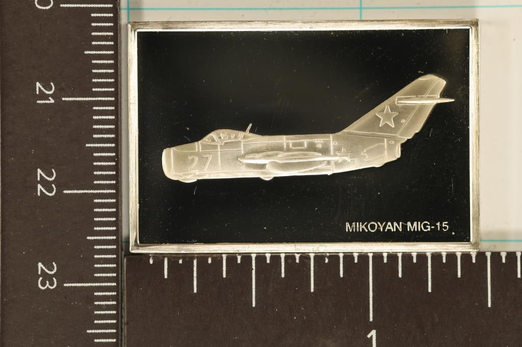 .61 TROY OZ. PF STERLING SILVER AVIATION INGOT: MIKOYAN MIG-15 EDGE MARKED, SOME MARKS ON THE REVERSE