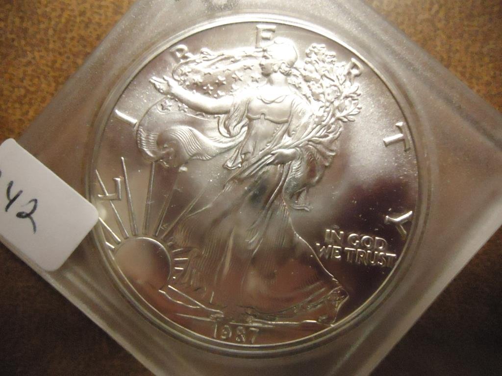 1987 AMERICAN SILVER EAGLE UNC (1 of 2)