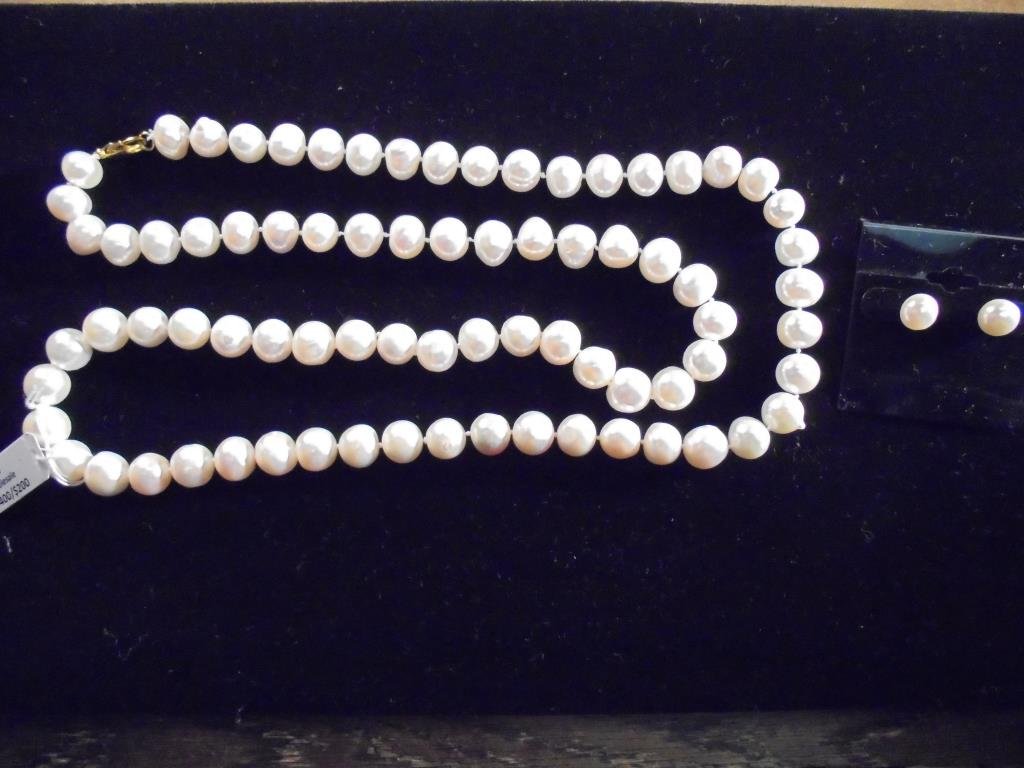 FRESH WATER PEARL NECKLACE & EARRING SET NECKLACE IS: NECKLACE IS 32" - 11-12MM PEARLS, EARRINGS ARE STUD 9-10MM. RETAILS IS $460.00, WHOLESALE IS $230.00. WHITE IN COLOR