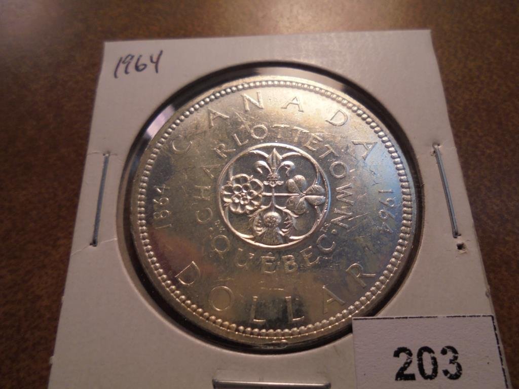 1964 CANADA SILVER DOLLAR (1 of 2)