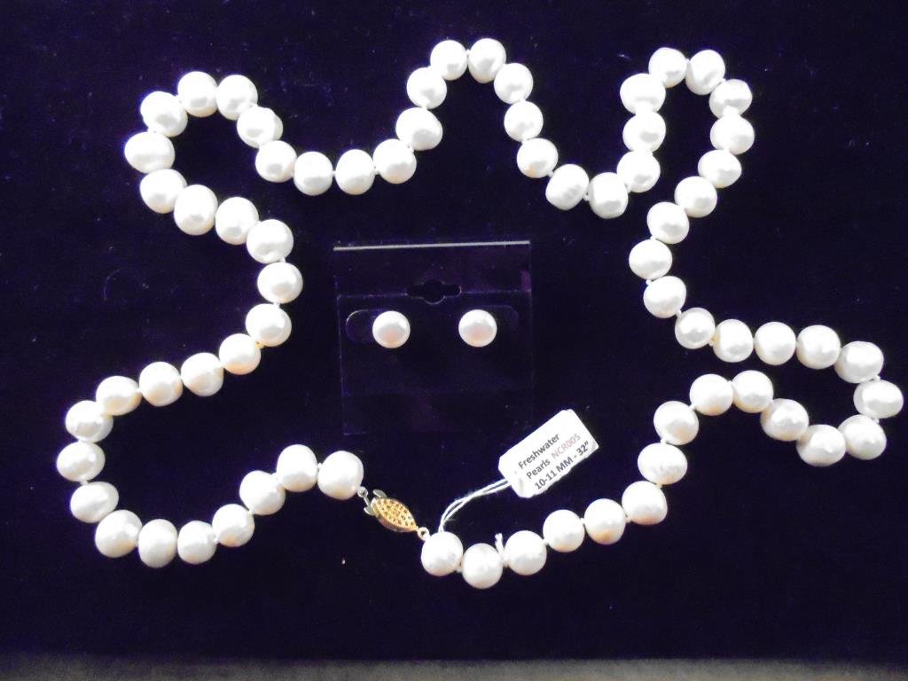 FRESH WATER PEARL NECKLACE & EARRING SET NECKLACE IS: NECKLACE IS 32" 10-11MM AND THE EARRINGS ARE 9-10MM. RETAILS FOR $460.00. WHITE IN COLOR, THESE PEARLS ARE HUGE ON THE NECKLACE. SOME OF THE LARGEST WE HAVE EVER HAD.