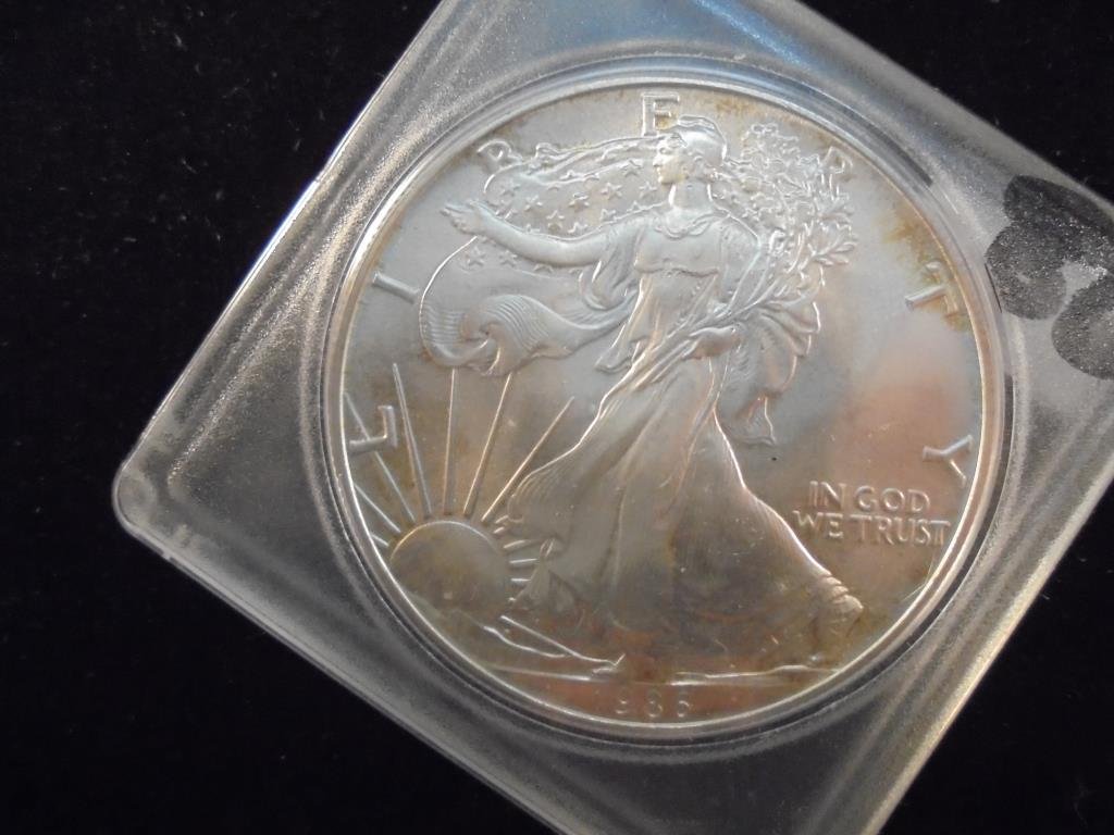 1986 AMERICAN SILVER EAGLE UNC (1 of 2)