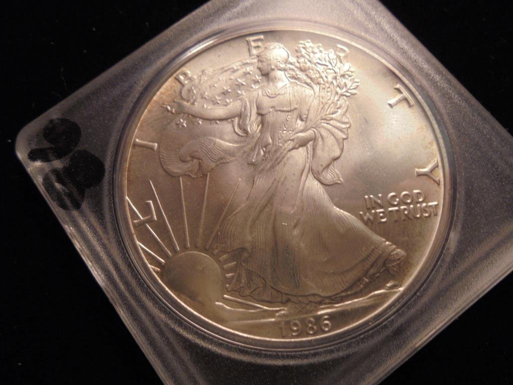 1986 AMERICAN SILVER EAGLE UNC (1 of 2)