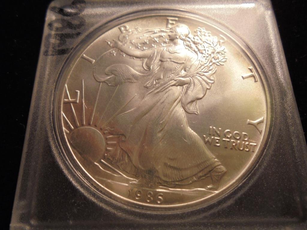 1986 AMERICAN SILVER EAGLE UNC (1 of 2)