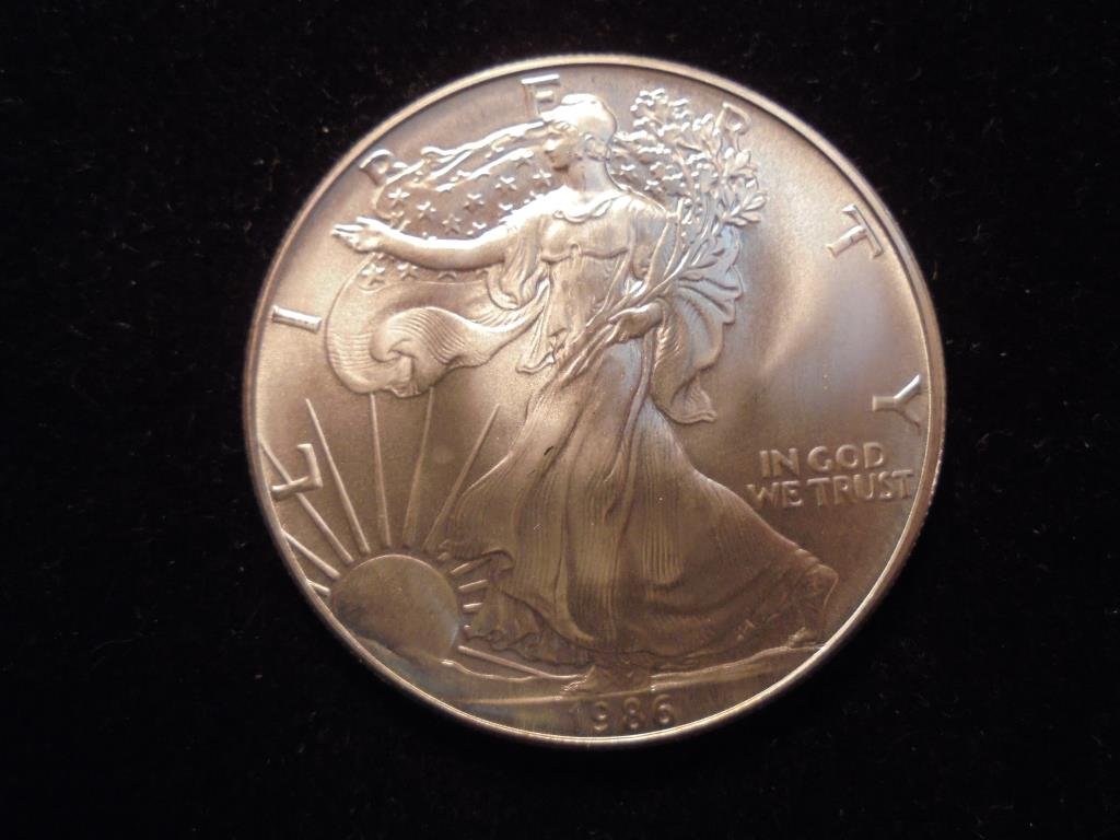 1986 AMERICAN SILVER EAGLE UNC (1 of 2)