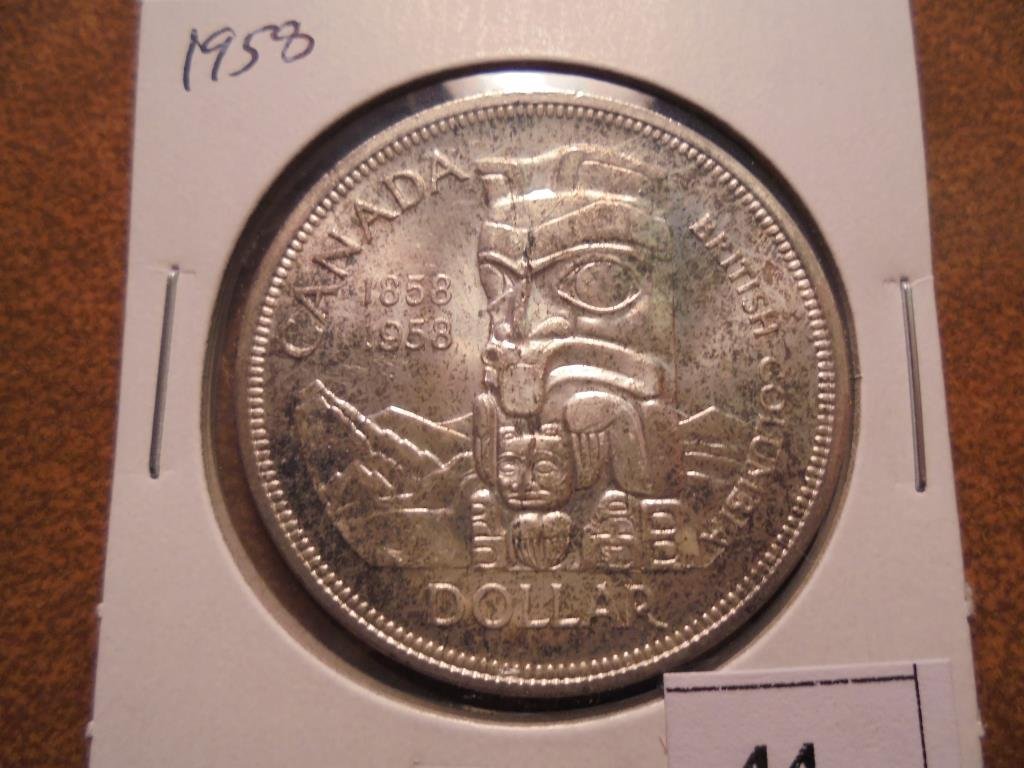 1958 CANADA TOTEM SILVER DOLLAR: You must call or email us with your credit card number directly