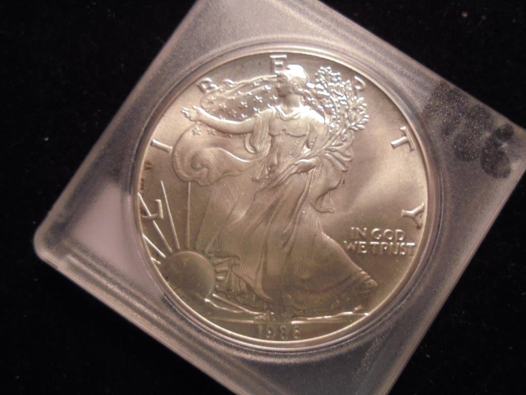 1986 AMERICAN SILVER EAGLE UNC (1 of 2)